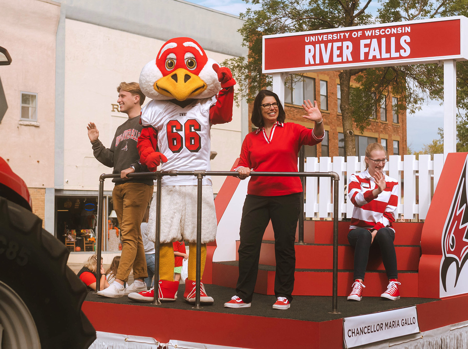 Chancellor Maria Gallo rides on top of the UWRF homecoming parade fload